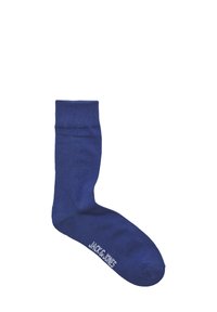 Katoenen sok in donkerblauw met een geribde boord, een gladde textuur en een wit logo "JACK & JONES" bij de enkel.