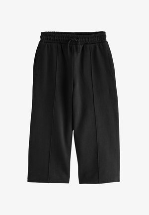 Next, REGULAR FIT - WIDE LEG JOGGERS . - Tracksuit bottoms - black