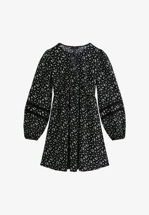 Czarna sukienka z białym kwiatowym nadrukiem, z długimi bufkami, marszczoną talią oraz okrągłym dekoltem z ozdobnym wiązaniem.