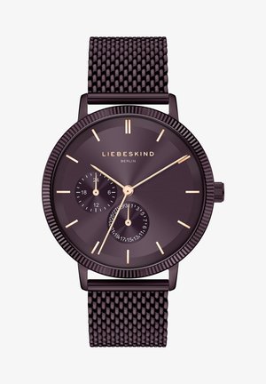 Runde lila Uhr mit einem metallischen Mesh-Armband. Verfügt über ein elegantes Zifferblatt, goldene Stundenmarkierungen und ein Ziffernblatt für die Sekunden. Markenname angezeigt.