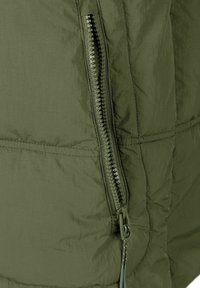 Olive green puffer jacket section featuring a visible zipper with textured teeth and a smooth, lightweight fabric. Stitching detail evident.