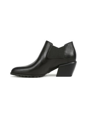 Black leather ankle boot with low stacked block heel and elastic side panels, shown in side profile on white background.