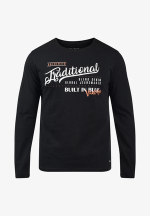 Črna dolga majica z dolgimi rokavi iz bombaža s krožnim izrezom. Na sprednji strani so bele in oranžne grafične besedne okrasitve. Gladka tekstura.