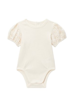 Body bébé couleur crème avec manches courtes bouffantes ornées d’une broderie ajourée et des fermetures pressionnées en bas et à l’arrière.