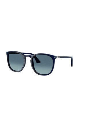 Gafas de sol cuadradas de color azul oscuro con lentes oscuras degradadas y patillas delgadas, mostradas sobre un fondo blanco.