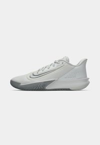 Vitaid sneakers med textilöverdel, rund tå och ett unikt sula-mönster. Har en minimalistisk design och grå detaljer.
