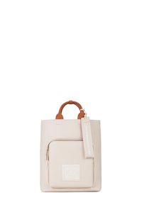 Borsa a tracolla color crema con manici arrotondati marroni, tasca frontale con cerniera e etichetta attaccata che recita "IO SONO UNA BORSA RESPONSABILE."
