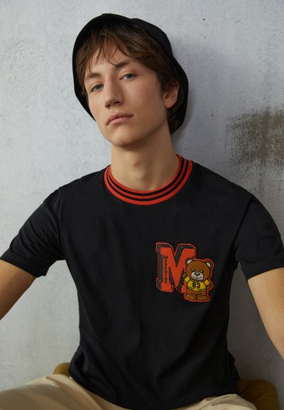 MOSCHINO INSTITUTIONAL - T-shirt estampada - black