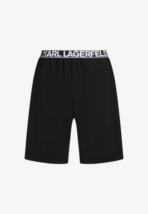 Shorts noirs avec une taille élastique arborant le logo blanc "KARL LAGERFELD". Matériau lisse, coupe ample et longueur standard.