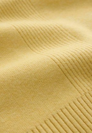 Yellow fabric with ribbed knit texture and visible soft, wavy folds creating a cozy, warm appearance.