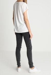 Cream T-shirt con stampa - off-white