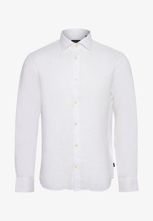 Camisa de manga larga blanca hecha de lino, con un color clásico, una textura sutil y botones amarillos a lo largo de la tapeta del frente.