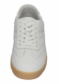 White sneaker with a smooth leather upper, flat laces, and subtle side accents. Features a gum rubber sole and padded ankle collar.