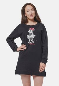 Abito lungo nero a maniche lunghe con una grafica di Minnie Mouse con un fiocco rosa, tessuto morbido e design con vestibilità relax.