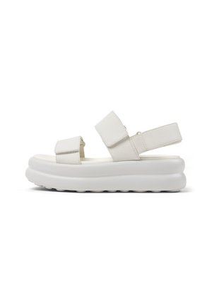 White sporty platform sandal with two adjustable Velcro straps over foot and one at the heel, thick cushioned sole, side view.
