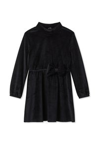 Czarna sukienka z korduroy z długimi rękawami, wysokim dekoltem i marszczonym stanem. Podkreślona dużą kokardą w talii.