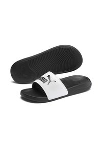 Infradito neri con una parte superiore in sintetico bianco, caratterizzati da un logo Puma nero, una soletta testurizzata e una suola in gomma flessibile.