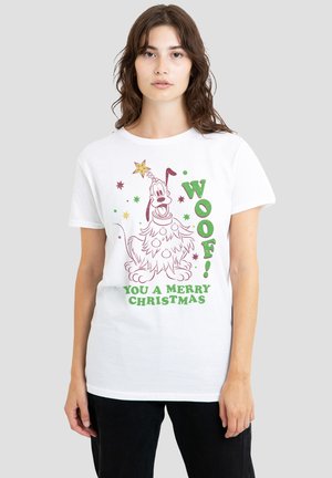 White cotton t-shirt featuring a graphic of a dog with Christmas ornaments, stars, and text in red and green: "Woof! You A Merry Christmas."