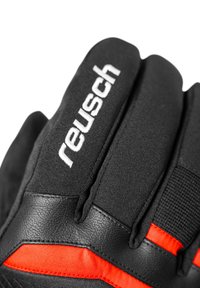 Zwarte handschoenen met een textuurstof en leren accenten, voorzien van rode details en het "Reusch"-logo in witte stiksels op de achterkant.