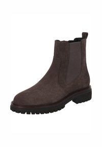 Botín Chelsea de ante marrón con panel lateral elástico, asa en la parte posterior y suela de goma negra resistente para mayor tracción.