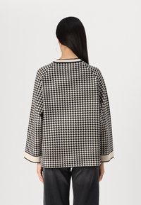 Object OBJESTER - Jumper - sandshell/black