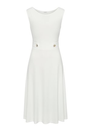 Vestido blanco sin mangas con un cuerpo ajustado, falda acampanada y dos adornos redondos en tono dorado a la altura de la cintura. Tejido suave con un acabado mate.