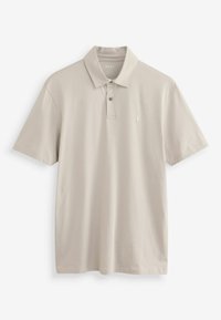 Beige kurzärmliges Poloshirt aus glattem Baumwollstoff, mit einer Knopfleiste mit zwei Knöpfen und einem kleinen gestickten Logo auf der Brust.
