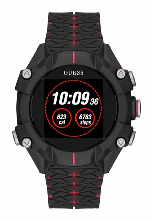 Schwarze und rote Guess Digital-Sportuhr, die die Zeit 10:09, 623 verbrannte Kalorien und 6783 Schritte auf dem Display anzeigt.