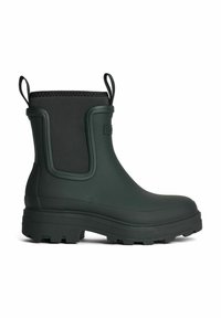 Green rubber ankle boot with a textured black fabric panel, rounded toe, and thick gripped sole. Features pull tabs for easy wear.