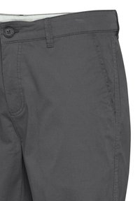 Gray chinos with a smooth texture, featuring a button closure, side pockets, and subtle stitching details along the seams.