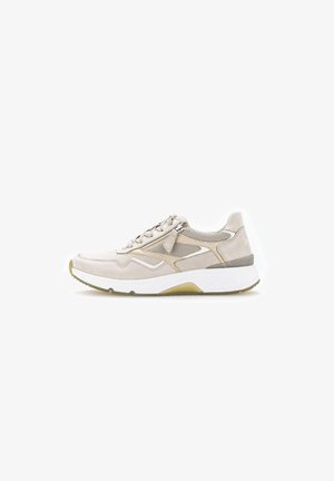 Beige suede and mesh sneaker with white accents, rounded toe, textured laces, and a thick white sole with a yellow-green bottom.