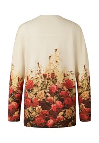 Sweter dziany w kremowym kolorze z kwiatowym wzorem przedstawiającym czerwone i kremowe róże przy dole. Długie rękawy, luźny krój, teksturowana tkanina.