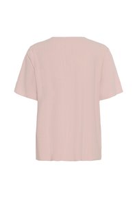 T-shirt rosa a maniche corte con scollatura rotonda e vestibilità ampia. Realizzato in tessuto leggero con una texture liscia. Nessun motivo o accento visibile.