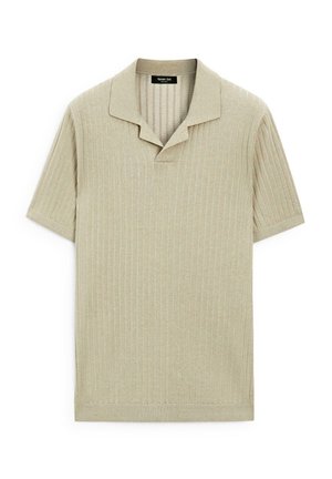 Polo shirt beige clair à manches courtes avec texture côtelée, col plat et ourlet droit. Design simple sans motifs ni accents visibles.