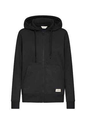 Hanorac negru cu fermoar, dintr-un material moale. Are o buzunar spațios în față, șnururi pe glugă și un etichetă în colțul din dreapta jos.