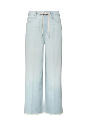 Hellblaue Jeans mit weitem Bein, ausgefransten Säumen und einem beigen Tunnelzug am Bund, mit Taschen vorne und hinten.