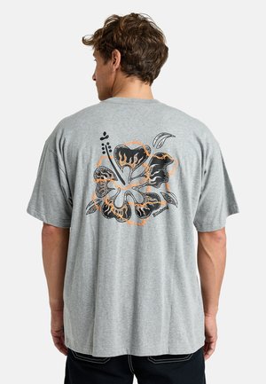Gray cotton t-shirt featuring a black and orange floral graphic on the back, with short sleeves and a relaxed fit.