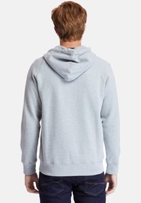 Felpa grigia chiaro realizzata in tessuto morbido. Presenta un cappuccio con cordino, polsini e orlo a coste, con un design semplice e pulito senza loghi visibili.