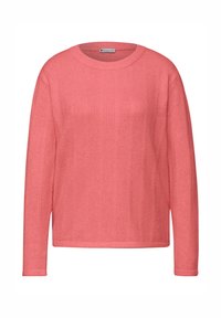 Korallinpunainen villapaita, jossa on resorinen pinta, pyöreä kaula-aukko ja pitkät hihat. Yksinkertainen muotoilu ilman lisäkuvioita tai koristeita.