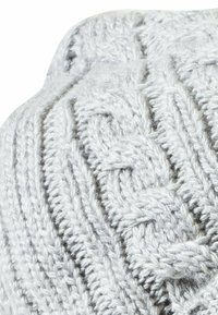 Knit beanie made of soft gray yarn featuring a textured cable pattern with slight shimmer. Rounded top and rolled edge design.