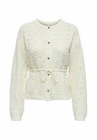 Cardigan blanc en maille avec un motif texturé, taille élastique avec détail noué, et des boutons en forme de cœur sur le devant.