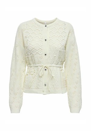 White knitted cardigan featuring a textured pattern, elastic waist with tie detail, and heart-shaped buttons along the front.