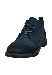 Bottines en suède bleu marine avec un bout rond, une tige texturée et des lacets gris. Équipées d'une languette et d'une semelle en caoutchouc noire avec des rainures.