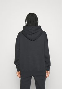 Under Armour Felpa con cappuccio - black