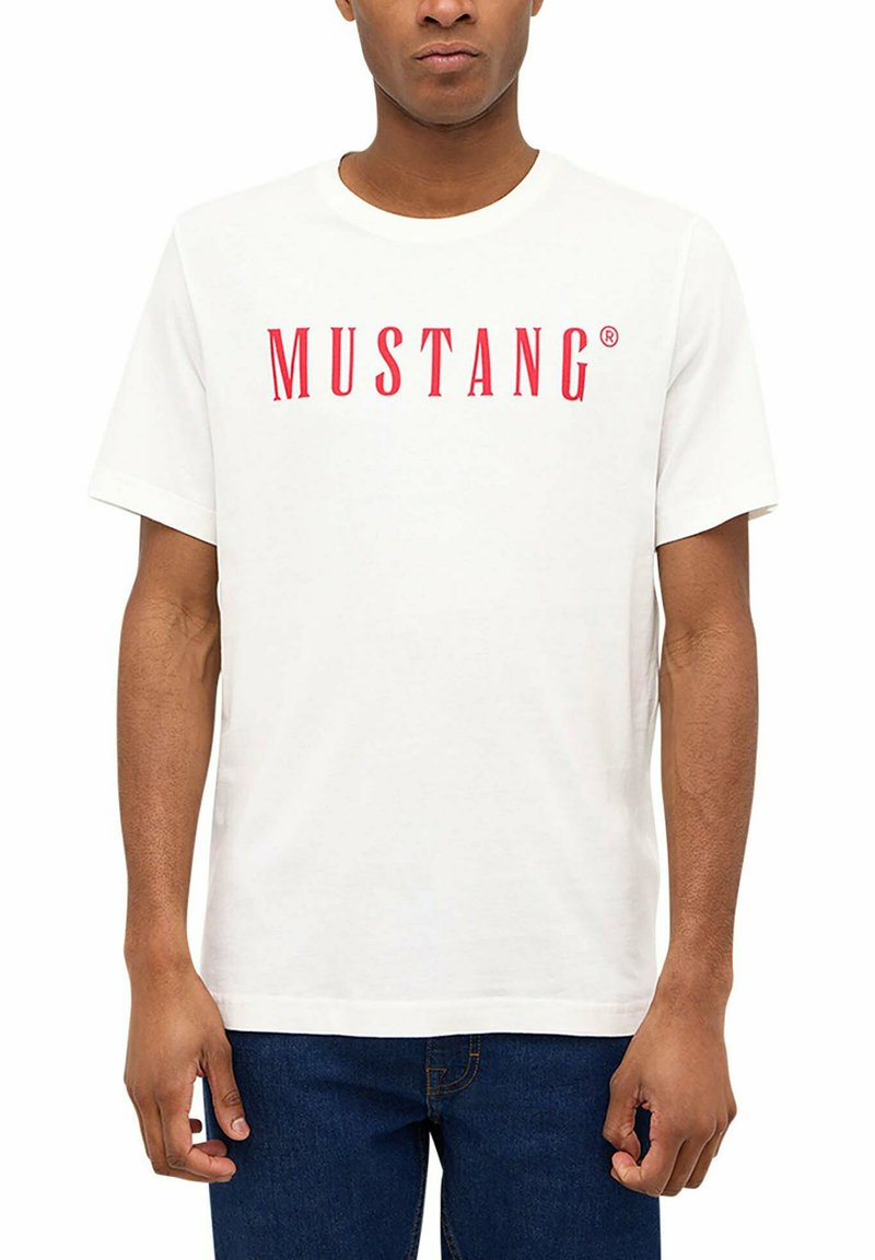 White short-sleeve t-shirt with red "MUSTANG" logo on the chest, made from cotton, featuring a crew neck and a relaxed fit.
