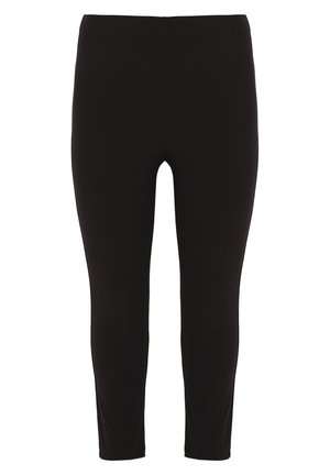 Leggings noirs en tissu extensible avec une texture lisse, dotés d'une taille haute et d'une coupe longueur cheville. Pas de coutures visibles.