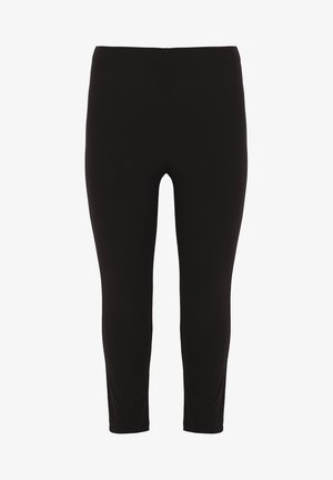 Schwarze Leggings aus dehnbarem Stoff mit glatter Textur, ausgestattet mit einem hohen Bund und einem knöchellangen Design. Keine sichtbaren Nähte.
