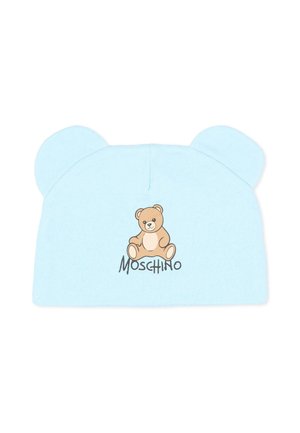 Jasnoniebieska czapeczka niemowlęca z uszkami misia i grafiką misia nad słowem Moschino z przodu.