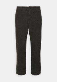 Bruna manchesterbyxor med vertikal ribbning, rak skärning, framfickor och stängning med en knapp. Har ett mjukt, texturerat tyg.