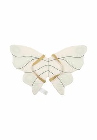 Pezzo di tessuto a forma di farfalla color crema con cuciture nere e cinturini elastici dorati. Texture morbida, ali simmetriche e bordi curvi.